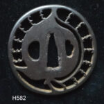 H582. Iron Sukashi Tsuba, Holbrook Collection