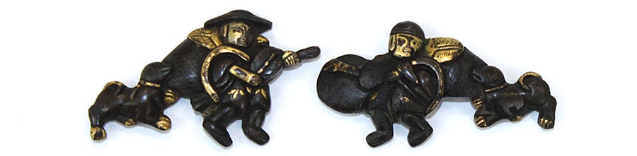 Menuki - m-95 Menuki: Design of Dog and Tang Chinese Musician, Shakudo-ji