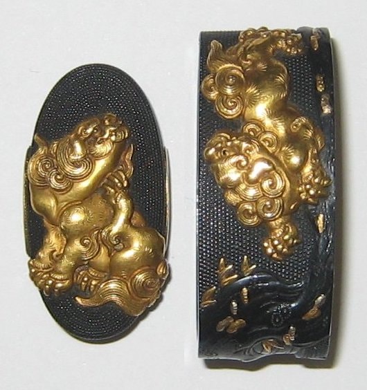 Fuchi-Kashira - Hozon - by Mito Hashizume Tomoyoshi - Fuchi-Kashira: Shishi (Lion) Design (Signed: Hashizume Tomoyoshi)