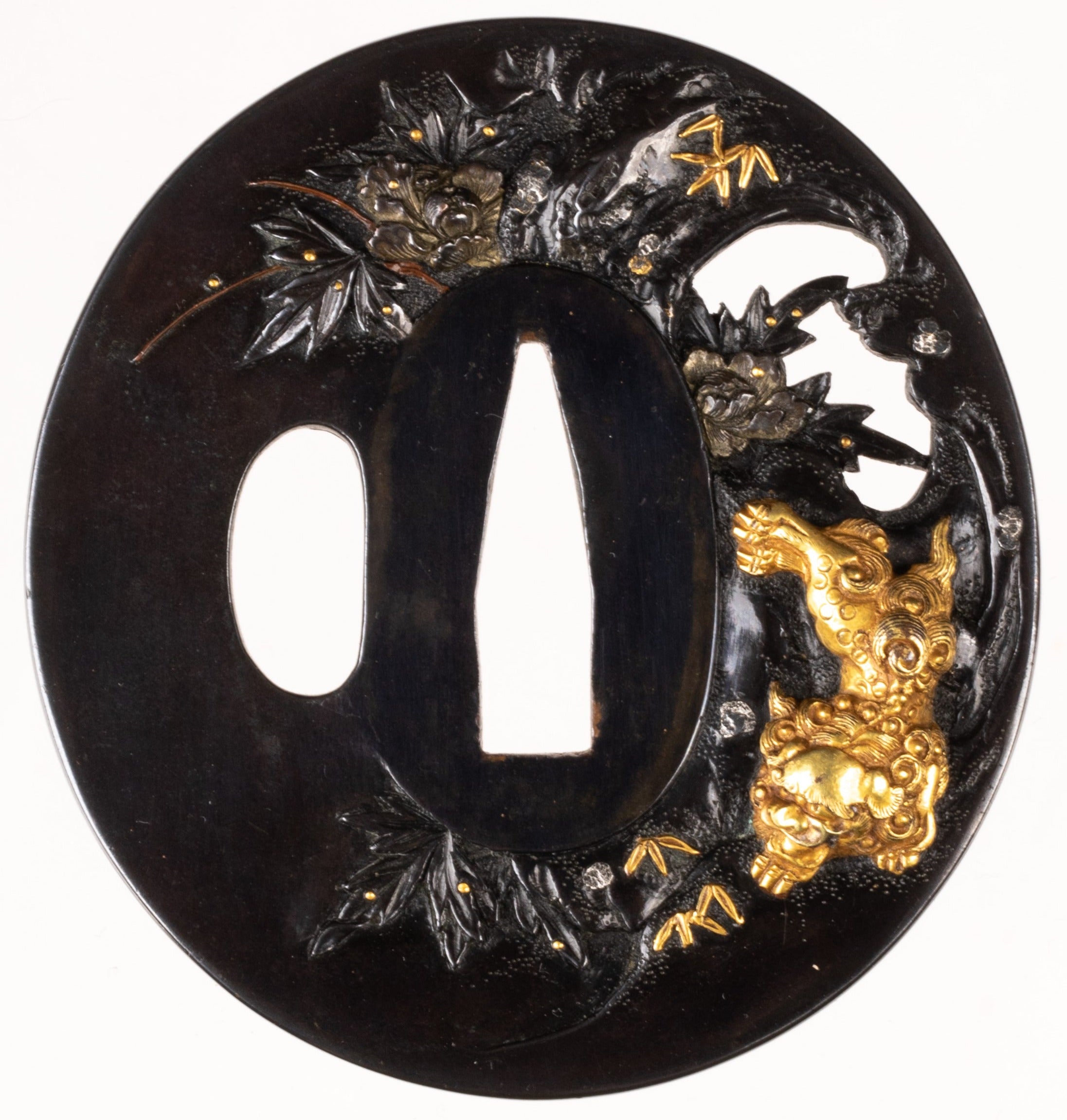 Shakudo migaki ji tsuba decorated with Shishi and peony