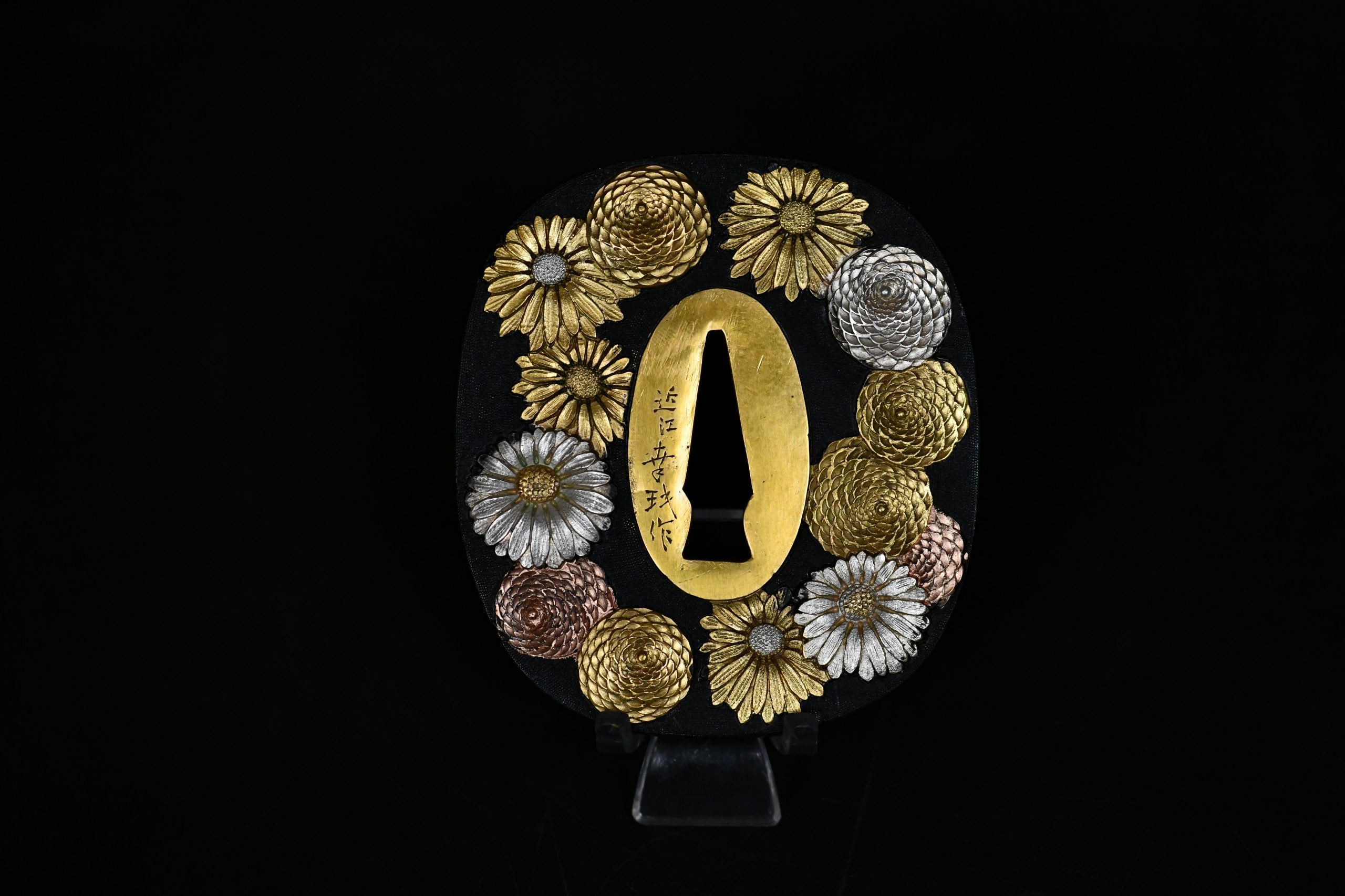 Tsuba - by Ōmi Yasumasa - Shakudo Marugata Tsuba Chrisantemum