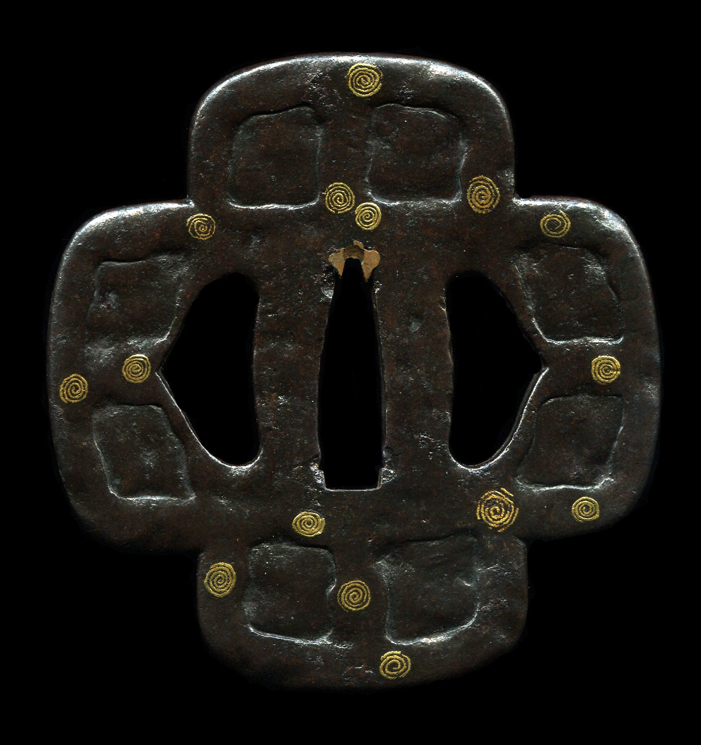 Beautiful early Jingo tsuba with iron that looks like melted chocolate.
