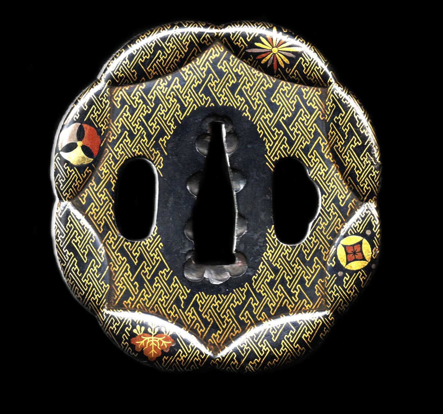 Spectacular soft metal tsuba by the Umetada School