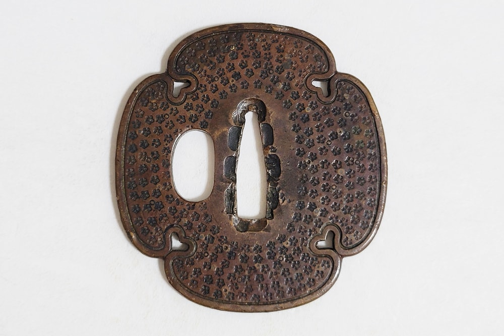 Tsuba - Hozon - Small Flower Pattern, Mumei (Shonai)