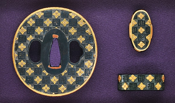 Fuchi-Kashira - Tokuho - by Nomura School - Tsuba and Fuchigashira: Mumei Nomura Manji-Hanakakumon-Ichimatsumoyo-zu